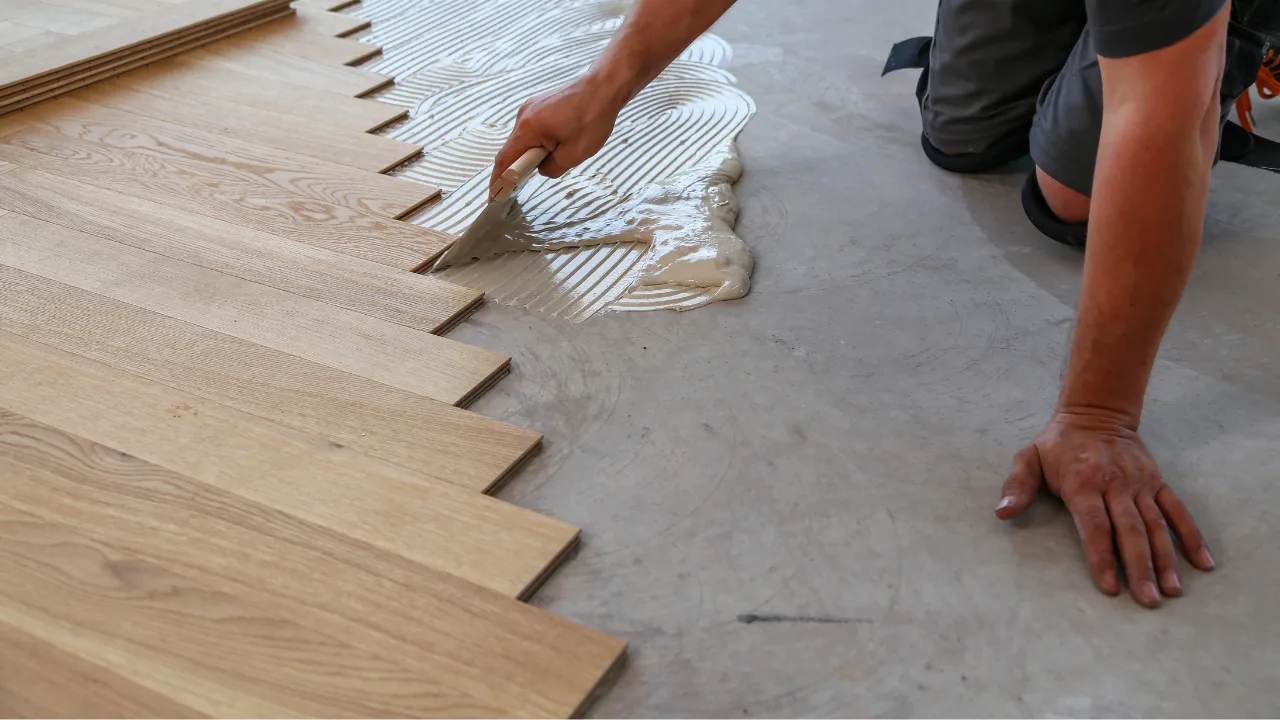 Floors To You OKC installer fitting new flooring in an Oklahoma City home